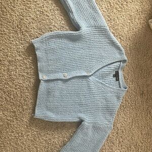 light blue knitted cardigan